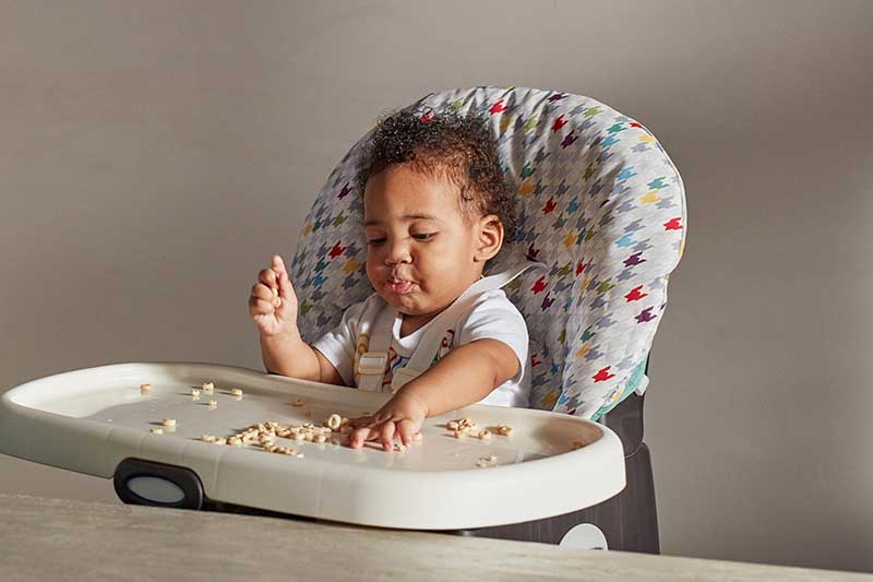 9 month old self-feeding toasted oats